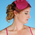 fuschia pink headpiece with veiling
