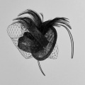 black wedding fascinator on a hair band by Holly Young