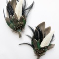 green feather hair clip and lapel pin set