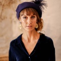 navy beret with feather hat pin