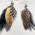 black gold spotty feather earrings