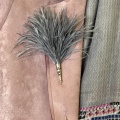 Grey feather lapel or hat pin