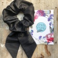 black bow scrunchie hair tie