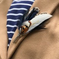 Navy and pheasant feather brooch