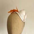 Ivory and orange small cocktail hat