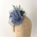 cornflower blue and green headpiece with pheasant feathers