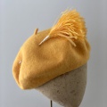 yellow feather hat pin