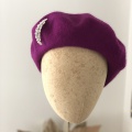 magenta purple beret with moon brooch