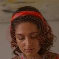 coral feather headband with veil