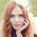 bird cage veil fascinator with ivory flower