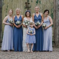 bridesmaids in blue two birds dresses