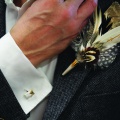 matching cufflinks and button hole with Gold