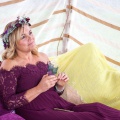 wedding guests relax in the big top tent