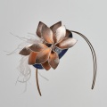 Rose gold fascinator on a hair band by Holly Young