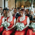 bridesmaids in red dresses