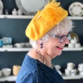 yellow feather hat pin