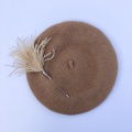 Tan beret with Pom Pom pin