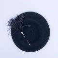 Black beret with Pom Pom pin