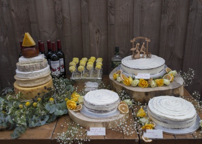 yellow theme wedding cakes table