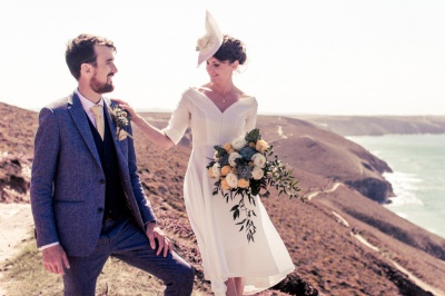bride and groom st Agnes cliffs Cornwall