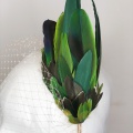 green feather headdress and veil for a bride