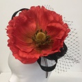 red poppy fascinator hat