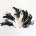 Black feather lapel pins for funeral