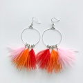 orange feather tassel earrings