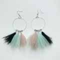 mint feather earrings Holly Young