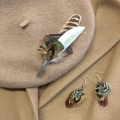 Pheasant feather accessories and beret