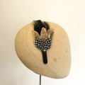 Black and gold decorative feather headband