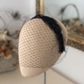 Black feather hair band with veil