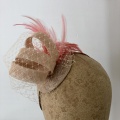 coral and nude fascinator