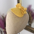 bright yellow bow fascinator