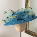 Modern ladies turquoise boater hat