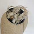 black and gold pheasant feather fascinator
