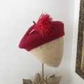 Red feather hat pin Holly Young