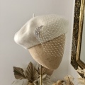 ivory bridal beret with veil and brooch