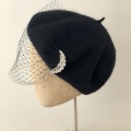 black veiled beret