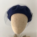 navy beret with birdcage veil