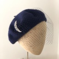 navy beret with birdcage veil