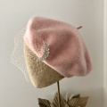 Light pink wool beret with veil