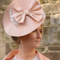 light peach statement hat with bow