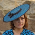 black and turquoise boater hat