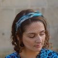 Turquoise feather headband with veil