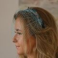 light turquoise veil and feather headband