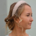 ivory headband with bird cage veil