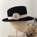 Black and gold rosette trilby