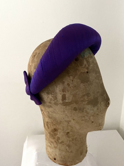 padded hatband with bow at the back