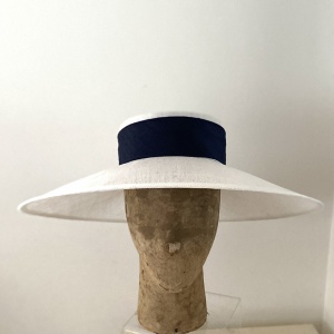 large white boater with navy ribbon